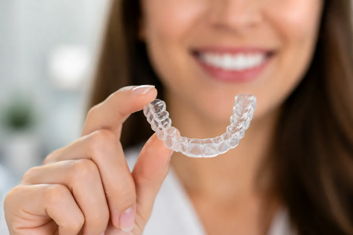 Close-up of a clear Invisalign aligner tray
